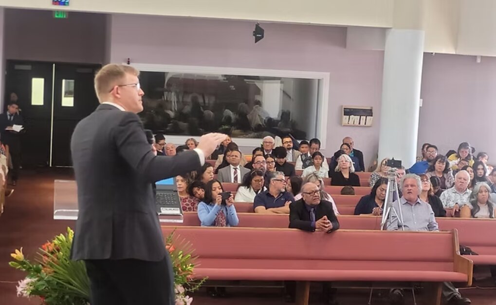 Bradley Burnham speaking to a church congregation